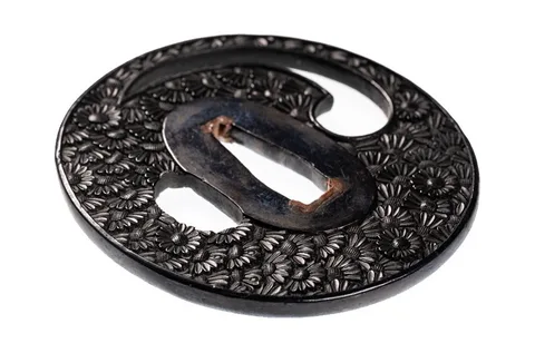 Detalle de Tsuba · Bushū