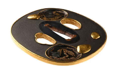 Detalle de Tsuba · Kaga Gotō