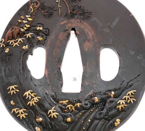 Detalle de Tsuba · Yoshimichi