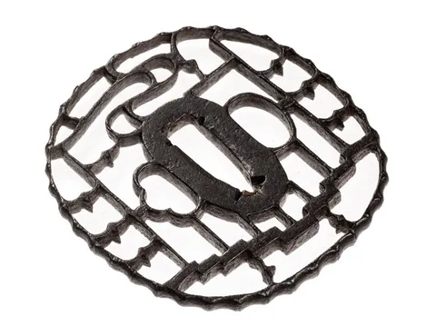 Detalle de Tsuba · Kyō-sukashi