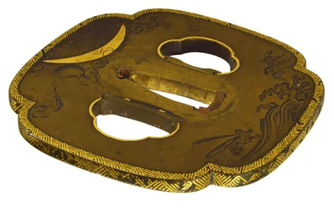 Detalle de Tsuba · Umetada