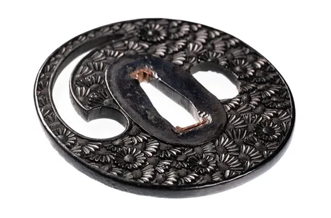 Detalle de Tsuba · Bushū