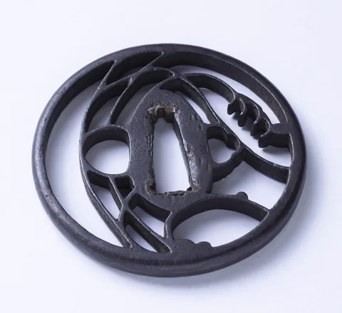 Detalle de Tsuba · Akasaka Tadamasa (2.ª generación)