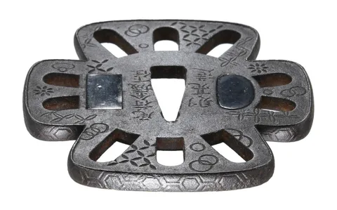 Detalle de Tsuba daishō · Norisuke