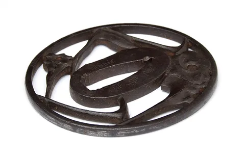 Detalle de Tsuba · Namitoshi