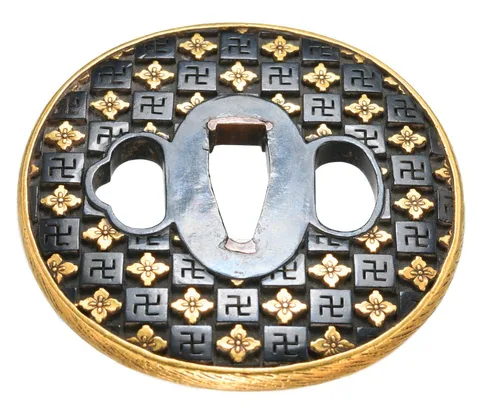 Detalle de Tsuba y fuchi-kashira · Nomura