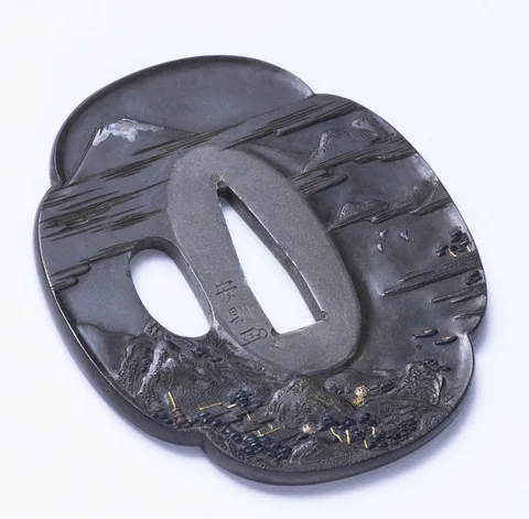 Detalle de Tsuba · Yasunori