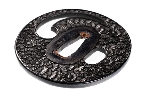 Detalle de Tsuba · Bushū