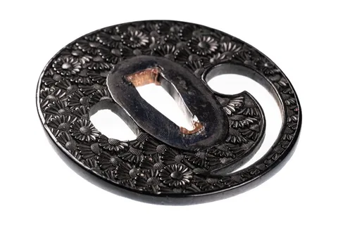 Detalle de Tsuba · Bushū