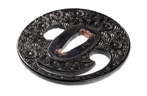 Detalle de Tsuba · Bushū