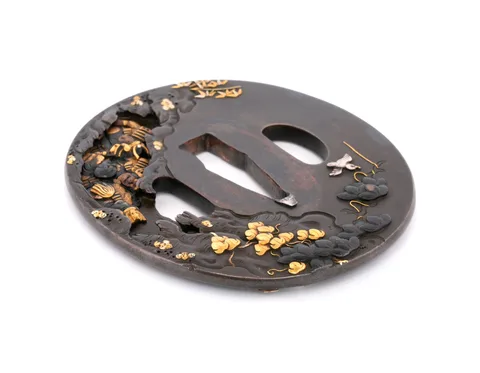 Detalle de Tsuba · Yoshimichi