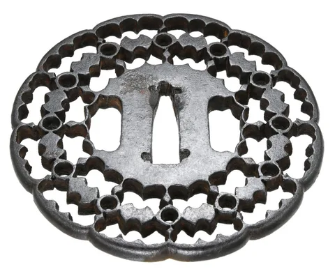 Detalle de Tsuba · Kyō-sukashi