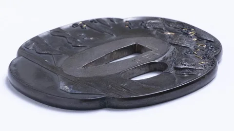 Detalle de Tsuba · Yasunori