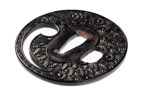 Detalle de Tsuba · Bushū