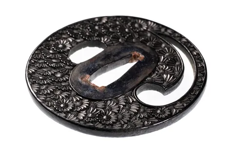 Detalle de Tsuba · Bushū