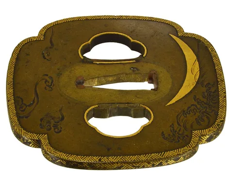 Detalle de Tsuba · Umetada