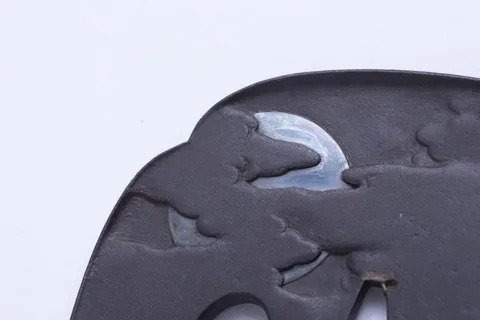 Detalle de Tsuba · Tokuoki