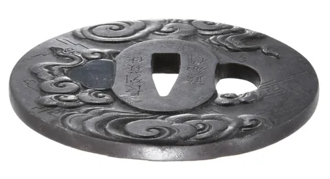 Detalle de Tsuba · Masatomo (escuela Chōshū)