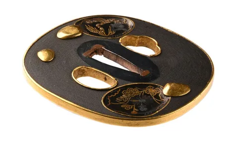 Detalle de Tsuba · Kaga Gotō