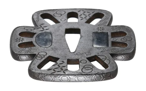 Detalle de Tsuba daishō · Norisuke