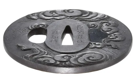 Detalle de Tsuba · Masatomo (escuela Chōshū)