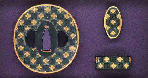 Guarniciones de Tsuba y fuchi-kashira · Nomura