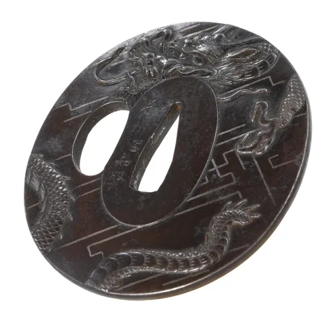 Detalle de Tsuba · Oka Tomokata (Chōshū)
