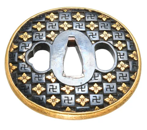 Detalle de Tsuba y fuchi-kashira · Nomura