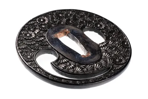 Detalle de Tsuba · Bushū