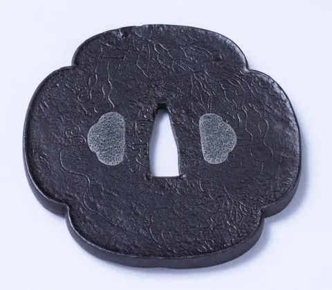 Detalle de Tsuba · Nobuie