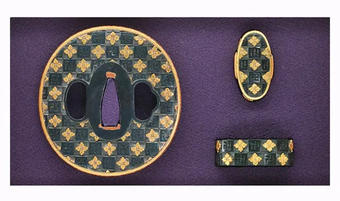 Guarniciones de Tsuba y fuchi-kashira · Nomura