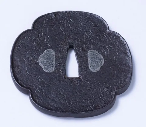 Detalle de Tsuba · Nobuie