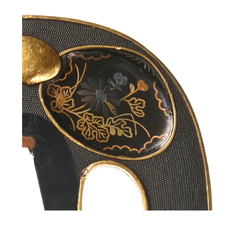 Detalle de Tsuba · Kaga Gotō