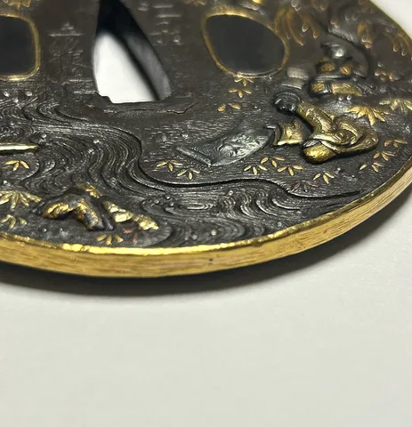 Detalle de Tsuba · Mogarashi Nyūdō Sōten