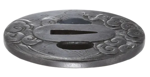 Detalle de Tsuba · Masatomo (escuela Chōshū)