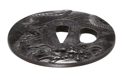 Detalle de Tsuba · Oka Tomokata (Chōshū)