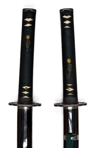 Guarniciones de Miyoshi Izu no Kami Minamoto Naokuni